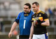 6 October 2019; Kilcar manager Barry Doherty comes of the pitch with Kilcar goalkeeper Eamonn McGinley the Donegal County Senior Club Football Championship semi-final match between Kilcar and Gaoth Dobhair at MacCumhaill Park in Ballybofey, Donegal. Photo by Oliver McVeigh/Sportsfile