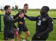 8 October 2019; Aaron Connolly is greeted by Michael Obafemi of the Republic of Ireland U21's following a Republic of Ireland training session at the FAI National Training Centre in Abbotstown, Dublin. Photo by Stephen McCarthy/Sportsfile