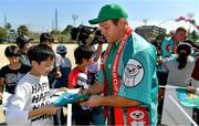 11 October 2019; Sean Cronin signs autographs for students during a visit by the Ireland rugby squad to Kasuga Elementary School in Kusaga, Fukuoka, Japan. Photo by Brendan Moran/Sportsfile
