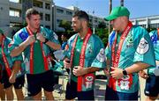11 October 2019; Ireland players, from left, Chris Farrell, Rob Kearney and Garry Ringrose wearing a happi, a traditional Japanese straight-sleeved coat which are usually worn during festivals, after being presented with them during a visit by the squad to Kasuga Elementary School in Kusaga, Fukuoka, Japan. Photo by Brendan Moran/Sportsfile