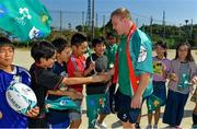 11 October 2019; John Ryan signs autographs for students during a visit by the Ireland rugby squad to Kasuga Elementary School in Kusaga, Fukuoka, Japan. Photo by Brendan Moran/Sportsfile