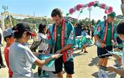 11 October 2019; Jack Carty signs autographs for students during a visit by the Ireland rugby squad to Kasuga Elementary School in Kusaga, Fukuoka, Japan. Photo by Brendan Moran/Sportsfile