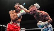 11 October 2019; Lewis Crocker, right, in action against Ohio Kain Iremiren during their welterweight bout at the MTK Fight Night in the Ulster Hall, Belfast. Photo by David Fitzgerald/Sportsfile