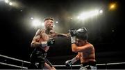 11 October 2019; Gary Cully, left, in action against Rafal Grabowski during their lightweight bout at the MTK Fight Night in the Ulster Hall, Belfast. Photo by David Fitzgerald/Sportsfile