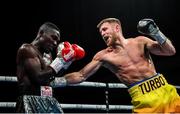 11 October 2019; Terry Flanagan, right, in action against Michael Ansah during their lightweight bout at the MTK Fight Night in the Ulster Hall, Belfast. Photo by David Fitzgerald/Sportsfile