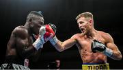 11 October 2019; Terry Flanagan, right, in action against Michael Ansah during their lightweight bout at the MTK Fight Night in the Ulster Hall, Belfast. Photo by David Fitzgerald/Sportsfile