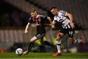 11 October 2019; Ross Tierney of Bohemians in action against Robbie Benson of Dundalk during the SSE Airtricity League Premier Division match between Bohemians and Dundalk at Dalymount Park in Dublin. Photo by Eóin Noonan/Sportsfile
