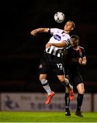 11 October 2019; Georgie Kelly of Dundalk in action against Aaron Barry of Bohemians during the SSE Airtricity League Premier Division match between Bohemians and Dundalk at Dalymount Park in Dublin. Photo by Eóin Noonan/Sportsfile