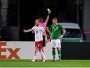 12 October 2019; Glenn Whelan of Republic of Ireland is shown a yellow card by referee Marco Guida during the UEFA EURO2020 Qualifier match between Georgia and Republic of Ireland at the Boris Paichadze Erovnuli Stadium in Tbilisi, Georgia. Photo by Seb Daly/Sportsfile