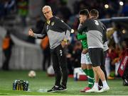 12 October 2019; Republic of Ireland assistant coach Robbie Keane speaks to Aaron Connolly of Republic of Ireland before coming on as a subsitute for James Collins during the UEFA EURO2020 Qualifier match between Georgia and Republic of Ireland at the Boris Paichadze Erovnuli Stadium in Tbilisi, Georgia. Photo by Stephen McCarthy/Sportsfile