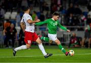 12 October 2019; Aaron Connolly of Republic of Ireland takes a shot under pressure from Gia Grigalava of Georgia during the UEFA EURO2020 Qualifier match between Georgia and Republic of Ireland at the Boris Paichadze Erovnuli Stadium in Tbilisi, Georgia. Photo by Seb Daly/Sportsfile