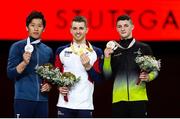12 October 2019; Medal winners, from left, Lee Chih-kai of Taiwan, Silver, Max Witlock of England, Gold, and Rhys McClenaghan of Ireland with his Bronze medal after the pommel-horse final during the 49th FIG Artistic Gymnastics World Championships at Stuttgart in Germany. Photo by Thomas Schreyer/Sportsfile