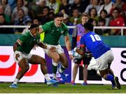 12 October 2019; Bundee Aki of Ireland prepares to tackle Ulupano Seuteni of Samoa, a tackle for which he received a red card, during the 2019 Rugby World Cup Pool A match between Ireland and Samoa at the Fukuoka Hakatanomori Stadium in Fukuoka, Japan. Photo by Brendan Moran/Sportsfile