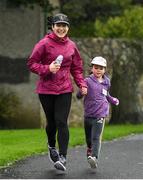 13 October 2019; The Deerpark Junior parkrun where Vhi hosted a special event to celebrate their partnership with parkrun Ireland. Vhi hosted a lively warm up routine which was great fun for children and adults alike. Crossing the finish line was a special experience as children were showered with bubbles and streamers to celebrate their achievement and each child received a gift. Junior parkrun in partnership with Vhi support local communities in organising free, weekly, timed 2km runs every Sunday at 9.30am. To register for a parkrun near you visit www.parkrun.ie.  Photo by Ramsey Cardy/Sportsfile