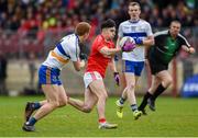 13 October 2019; Lee Brennan of Trillick in action against Peter Harte of Errigal Ciaran during the Tyrone County Senior Club Football Championship Final match between Errigal Ciaran and Trillick at Healy Park in Omagh, Tyrone. Photo by Oliver McVeigh/Sportsfile