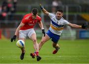 13 October 2019; Richard Donnelly of Trillick in action against Pauric McAnenly of Errigal Ciaran during the Tyrone County Senior Club Football Championship Final match between Errigal Ciaran and Trillick at Healy Park in Omagh, Tyrone. Photo by Oliver McVeigh/Sportsfile