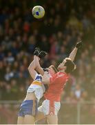 13 October 2019; Joe Oguz of Errigal Ciaran in action against Ruairi Kellyof Trillick during the Tyrone County Senior Club Football Championship Final match between Errigal Ciaran and Trillick at Healy Park in Omagh, Tyrone. Photo by Oliver McVeigh/Sportsfile