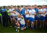 13 October 2019; St Patrick's players celebrate with the Miley Cup after the Wicklow County Senior Club Football Championship Final match between St Patrick's GAA Club and Arklow Geraldines Ballymoney GAA Club at County Grounds in Aughrim, Wicklow. Photo by Garry O'Neill/Sportsfile