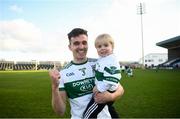 13 October 2019; Portlaoise captain David Seale celebrates with his nephew Regan Lannam, age 4, following the Laois County Senior Club Football Championship Final match between Portlaoise and Killeshin at O’Moore Park in Portlaoise, Laois. Photo by David Fitzgerald/Sportsfile