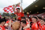 13 October 2019; Michael Gallagher and Trillick players celebrate with the O'Neill Cup after the Tyrone County Senior Club Football Championship Final match between Errigal Ciaran and Trillick at Healy Park in Omagh, Tyrone. Photo by Oliver McVeigh/Sportsfile