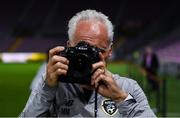 14 October 2019; Republic of Ireland manager Mick McCarthy photographs Sportsfile photographer Stephen McCarthy following a Republic of Ireland training session at Stade de Genève in Geneva, Switzerland. Photo by Stephen McCarthy/Sportsfile