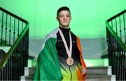 15 October 2019; Rhys McClenaghan of Ireland poses for a portrait with his Bronze medal from the pommel-horse final at the 49th FIG Artistic Gymnastics World Championships during the Gymnastics Ireland Homecoming Press Conference at Ely Place in Dublin. Photo by Sam Barnes/Sportsfile