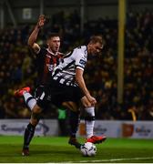 11 October 2019; Georgie Kelly of Dundalk in action against Aaron Barry of Bohemians during the SSE Airtricity League Premier Division match between Bohemians and Dundalk at Dalymount Park in Dublin. Photo by Eóin Noonan/Sportsfile