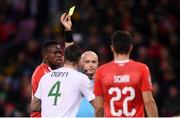 15 October 2019; Referee Szymon Marciniak issues Shane Duffy of Republic of Ireland with a yellow card during the UEFA EURO2020 Qualifier match between Switzerland and Republic of Ireland at Stade de Genève in Geneva, Switzerland. Photo by Stephen McCarthy/Sportsfile