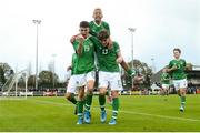 17 October 2019; Adam Nugent of Republic of Ireland, left, celebrates with team-mates, Kevin Zefi, right, and Caden McLoughlin after scoring his side's third goal of the game during the Under-15 UEFA Development Tournament match between Republic of Ireland and Latvia at Solar 21 Park, Castlebar, Mayo. Photo by Eóin Noonan/Sportsfile