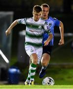 18 October 2019; Brandon Kavanagh of Shamrock Rovers in action against Jack Keaney of UCD during the SSE Airtricity League Premier Division match between UCD and Shamrock Rovers at The UCD Bowl in Belfield, Dublin. Photo by Ben McShane/Sportsfile