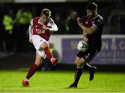 18 October 2019; Chris Forrester of St Patrick's Athletic has a shot at goal under pressure from Aaron Barry of Bohemians during the SSE Airtricity League Premier Division match between St Patrick's Athletic and Bohemians at Richmond Park in Dublin. Photo by Harry Murphy/Sportsfile