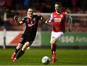 18 October 2019; Derek Pender of Bohemians in action against Chris Forrester of St Patrick's Athletic during the SSE Airtricity League Premier Division match between St Patrick's Athletic and Bohemians at Richmond Park in Dublin. Photo by Harry Murphy/Sportsfile