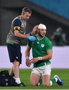 19 October 2019; Robbie Henshaw of Ireland receives medical attention from Ireland team physio Keith Fox during the 2019 Rugby World Cup Quarter-Final match between New Zealand and Ireland at the Tokyo Stadium in Chofu, Japan. Photo by Brendan Moran/Sportsfile