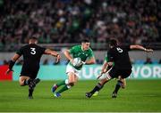 19 October 2019; Jonathan Sexton of Ireland in action against Nepo Laulala, left, and Ardie Savea of New Zealand during the 2019 Rugby World Cup Quarter-Final match between New Zealand and Ireland at the Tokyo Stadium in Chofu, Japan. Photo by Ramsey Cardy/Sportsfile