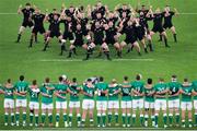 19 October 2019; New Zealand perform the &quot;Haka&quot; as Ireland players watch on before the 2019 Rugby World Cup Quarter-Final match between New Zealand and Ireland at the Tokyo Stadium in Chofu, Japan. Photo by Juan Gasparini/Sportsfile