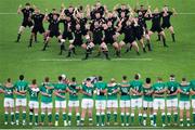 19 October 2019; New Zealand perform the &quot;Haka&quot; as Ireland players watch on before the 2019 Rugby World Cup Quarter-Final match between New Zealand and Ireland at the Tokyo Stadium in Chofu, Japan. Photo by Juan Gasparini/Sportsfile