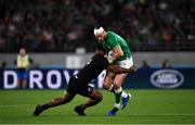 19 October 2019; Robbie Henshaw of Ireland is tackled by Sevu Reece of New Zealand during the 2019 Rugby World Cup Quarter-Final match between New Zealand and Ireland at the Tokyo Stadium in Chofu, Japan. Photo by Brendan Moran/Sportsfile