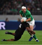 19 October 2019; Robbie Henshaw of Ireland is tackled by Sevu Reece of New Zealand during the 2019 Rugby World Cup Quarter-Final match between New Zealand and Ireland at the Tokyo Stadium in Chofu, Japan. Photo by Brendan Moran/Sportsfile