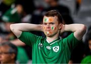 19 October 2019; A dejected Ireland supporter during the 2019 Rugby World Cup Quarter-Final match between New Zealand and Ireland at the Tokyo Stadium in Chofu, Japan. Photo by Ramsey Cardy/Sportsfile