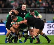 19 October 2019; CJ Stander of Ireland is tackled by Richie Mo'unga, left, with Kieran Read of New Zealand during the 2019 Rugby World Cup Quarter-Final match between New Zealand and Ireland at the Tokyo Stadium in Chofu, Japan. Photo by Ramsey Cardy/Sportsfile