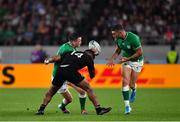 19 October 2019; Jonathan Sexton of Ireland is tackled by Sevu Reece of New Zealand as he attempts to pass to team-mate Rob Kearney during the 2019 Rugby World Cup Quarter-Final match between New Zealand and Ireland at the Tokyo Stadium in Chofu, Japan. Photo by Brendan Moran/Sportsfile