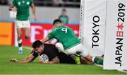 19 October 2019; Codie Taylor of New Zealand scores his side's fourth try despite the tackle of Conor Murray of Ireland during the 2019 Rugby World Cup Quarter-Final match between New Zealand and Ireland at the Tokyo Stadium in Chofu, Japan. Photo by Brendan Moran/Sportsfile