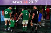 19 October 2019; Peter O'Mahony of Ireland and his daughter leave the pitch with team-mate Rob Kearney, left, and Kieran Read of New Zealand after the 2019 Rugby World Cup Quarter-Final match between New Zealand and Ireland at the Tokyo Stadium in Chofu, Japan. Photo by Brendan Moran/Sportsfile