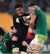 19 October 2019; Ardie Savea of New Zealand is tackled by Cian Healy, left, and Iain Henderson of Ireland during the 2019 Rugby World Cup Quarter-Final match between New Zealand and Ireland at the Tokyo Stadium in Chofu, Japan. Photo by Ramsey Cardy/Sportsfile