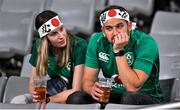 19 October 2019; Dejected Ireland supporters after the 2019 Rugby World Cup Quarter-Final match between New Zealand and Ireland at the Tokyo Stadium in Chofu, Japan. Photo by Brendan Moran/Sportsfile