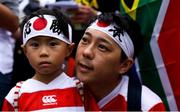 20 October 2019; Japan supporters sing the South Africa National Anthem ahead of the 2019 Rugby World Cup Quarter-Final match between Japan and South Africa at the Tokyo Stadium in Chofu, Japan. Photo by Ramsey Cardy/Sportsfile