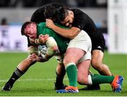 19 October 2019; Tadhg Furlong of Ireland is tackled by Samuel Whitelock and Angus Ta'avao of New Zealand during the 2019 Rugby World Cup Quarter-Final match between New Zealand and Ireland at the Tokyo Stadium in Chofu, Japan. Photo by Brendan Moran/Sportsfile