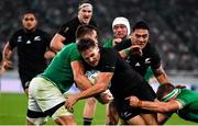 19 October 2019; George Bridge of New Zealand is tackled by CJ Stander, left, and Josh Van der Flier of Ireland during the 2019 Rugby World Cup Quarter-Final match between New Zealand and Ireland at the Tokyo Stadium in Chofu, Japan. Photo by Brendan Moran/Sportsfile