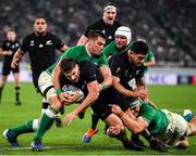 19 October 2019; George Bridge of New Zealand is tackled by CJ Stander, left, and Josh Van der Flier of Ireland during the 2019 Rugby World Cup Quarter-Final match between New Zealand and Ireland at the Tokyo Stadium in Chofu, Japan. Photo by Brendan Moran/Sportsfile