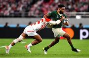 20 October 2019; Lukhanyo Am of South Africa is tackled by Amanaki Lelei Mafi of Japan during the 2019 Rugby World Cup Quarter-Final match between Japan and South Africa at the Tokyo Stadium in Chofu, Japan. Photo by Brendan Moran/Sportsfile